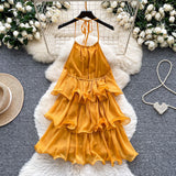 Yellow Dress Women 2025 Summer French Atmosphere With A Sense Of Hanging Neck Sling Lotus Side Splicing Cake Holiday Skirt