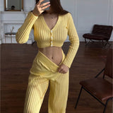 Spring/Summer 2025 New Knitted Set Of Women's Fluorosclumned Casual Solid Color Hollow High-Waisted Trousers Commuting Suit