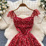 French Sweet Design With A Knotted Bow Tie With Bare Back To The Waist Of A Floral Dress