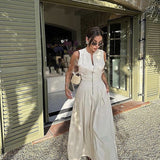 Spring 2025 New Women's Dress French Design Round Neckless Sleeveless Commuting Temperament Fan Flute Dress