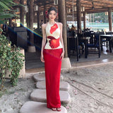 Fashion 2025 Spring And Summer Women's New Seaside Vacation Wind Hanging Neck Vest Sexy Hip Skirt Suit