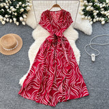 2025 Summer New Small High-End Sense V-Neck Short-Sleeved Waist Irregular Open-Fork Print Dress Women's Long Dress